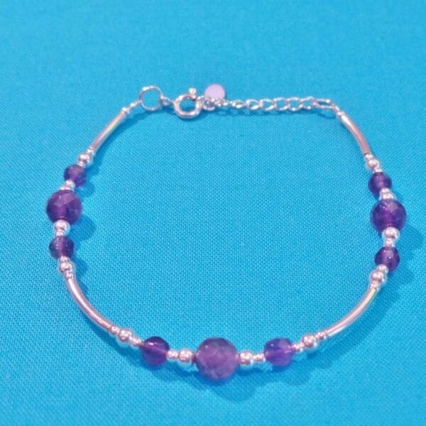 Dainty Amethyst Bracelet with Curved Silver Sleeves