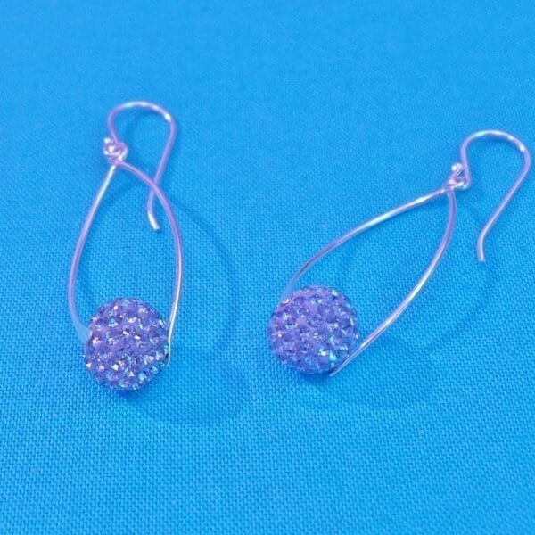 Oval Silver Earrings with Sapphire Coloured Crystal Balls