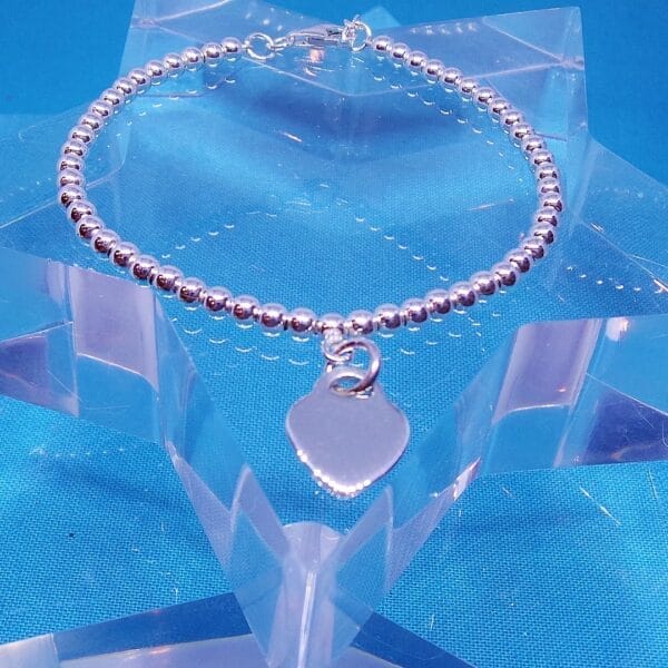 Pretty Flat Heart and Silver Beaded Bracelet