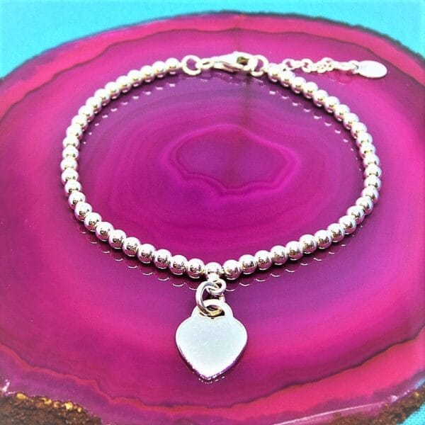 Pretty Flat Heart and Silver Beaded Bracelet