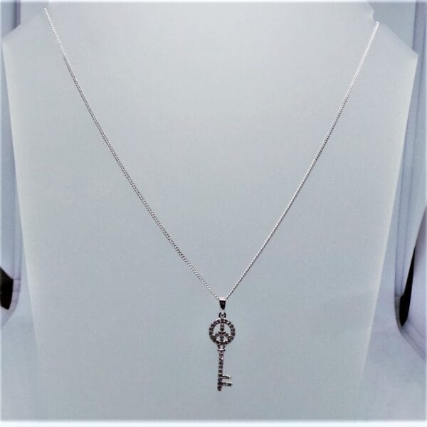 Sparkling Crystal Sterling Silver Key Pendant