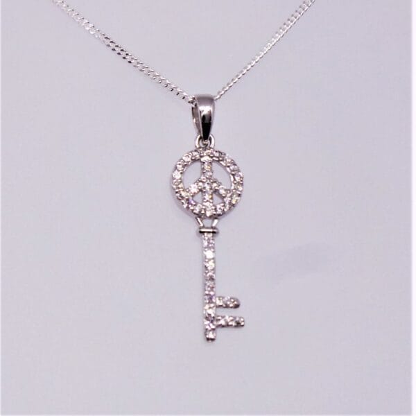 Sparkling Crystal Sterling Silver Key Pendant