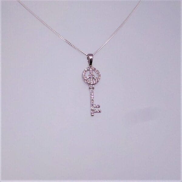 Sparkling Crystal Sterling Silver Key Pendant