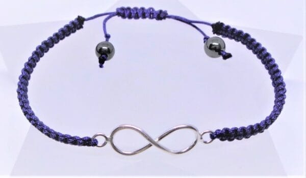 Gorgeous Waxed Blue and Sterling Silver Infinity Bracelet