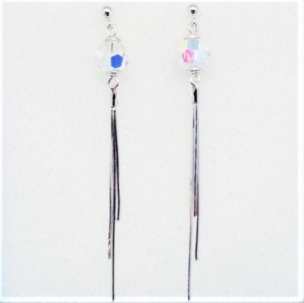 Sleek Swarovski Clear Pom Pom Sterling Silver Tassel Earrings