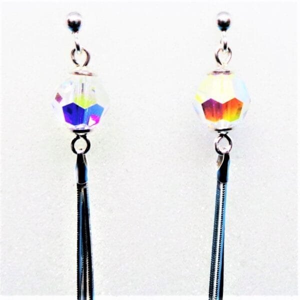 Sleek Swarovski Clear Pom Pom Sterling Silver Tassel Earrings