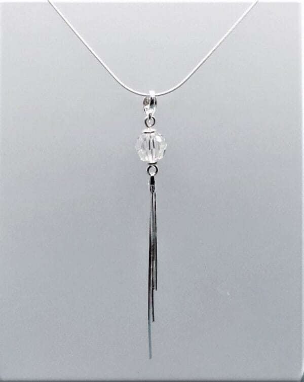 Sleek Swarovski Clear Crystal Necklace with Tassel