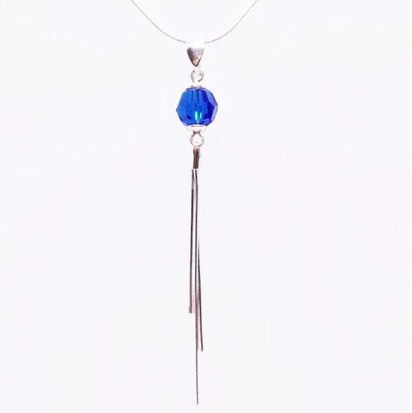 Sleek Swarovski Blue Pom Pom Necklace with Tassel